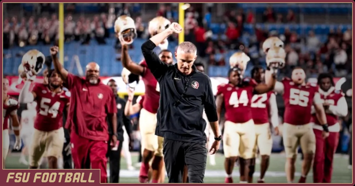 Mike Norvell leading the FSU team in the legacy walk at the 2023 ACC championship game